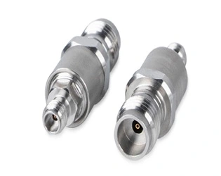 How do different types of coaxial cable adapters vary in performance?
